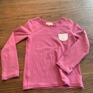 Pinkish/ purple long sleeve top with a white crochet pocket